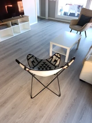 Butaca diseño metal y tela geométrica