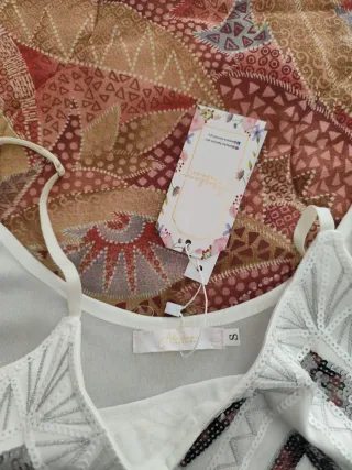 Vestito bianco con paillettes argento