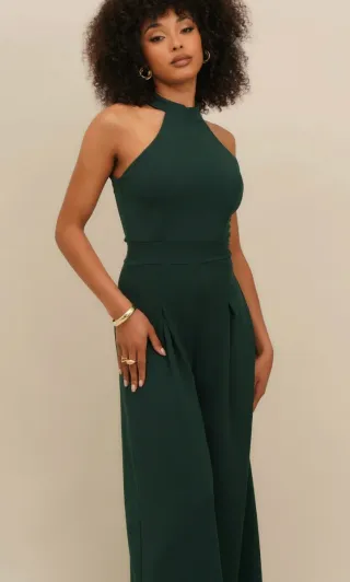 Mono verde oscuro de fiesta atado al cuello