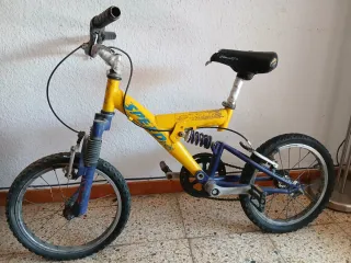 Bicicleta niño amarilla suspensión