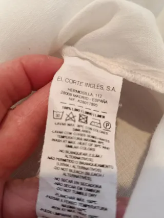 Blusa blanca con bolsillos