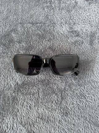 Occhiali da sole Miu Miu neri e rosa