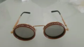 Occhiali da sole rotondi modulabili