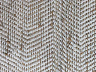 Alfombra de yute beige y blanco