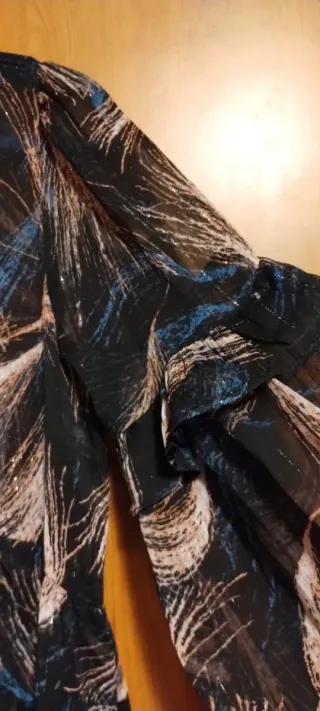 Blusa donna con stampa piuma