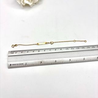 Pulsera de oro 18kt con nombre y mariposa