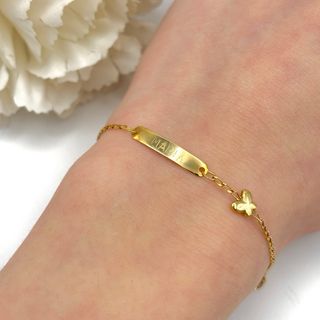 Pulsera de oro 18kt con nombre y mariposa