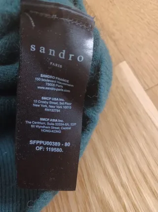 Jersey Sandro verde con cuello.
