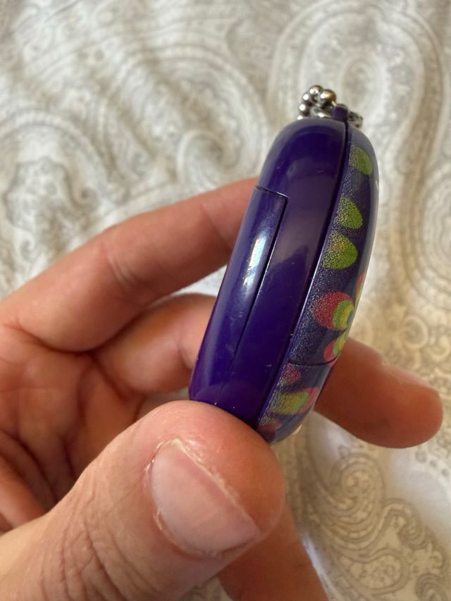 Tamagotchi con diseño floral