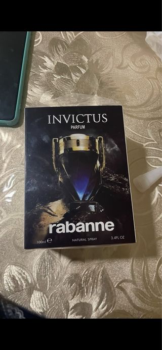 Perfume Invictus Paco Rabanne Negro y Dorado