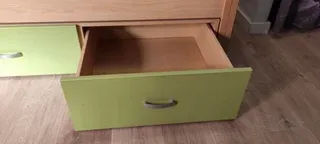 Cama nido con cajones y estantería