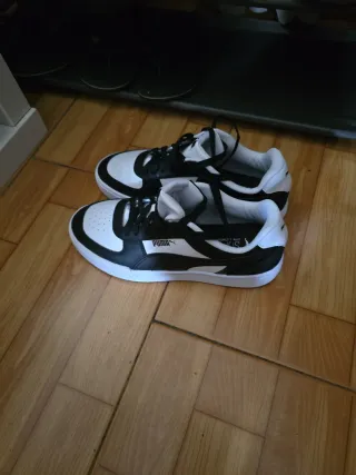 Zapatillas Puma altas blancas y azules