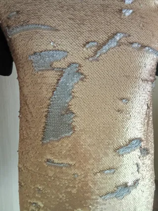 Miniabito con paillettes oro