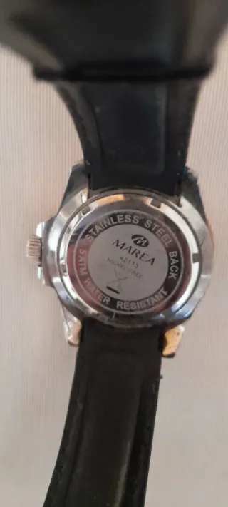 Reloj Marea Negro y cobre dorado