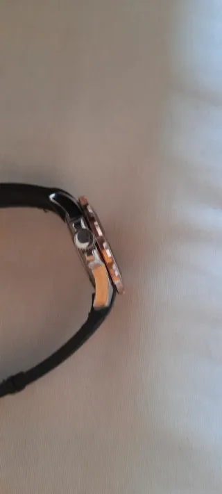 Reloj Marea Negro y cobre dorado