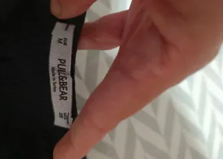 Body negro con franja arcoíris