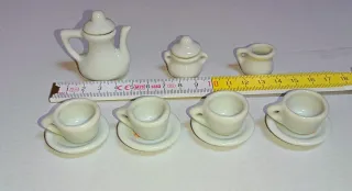 Set da tè miniature in porcellana con orsetti.