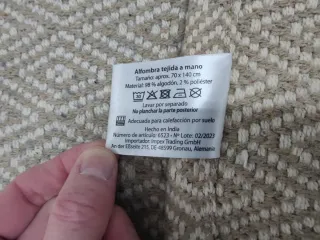 Tappeto in cotone beige e bianco