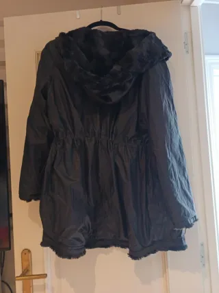 Chaqueta reversible pelo e impermeable
