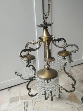 Lampadario oro e cristalli