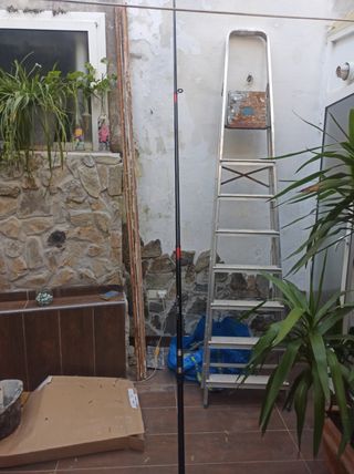 Caña de pescar con carrete y funda de Neopreno