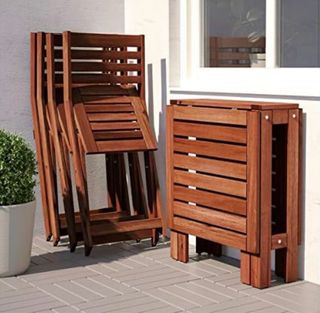 Conjunto terraza mesa extensible y sillas madera.