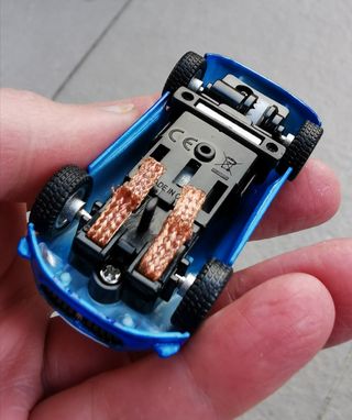 Coche Slot motor eléctrico pista carreras 1:64