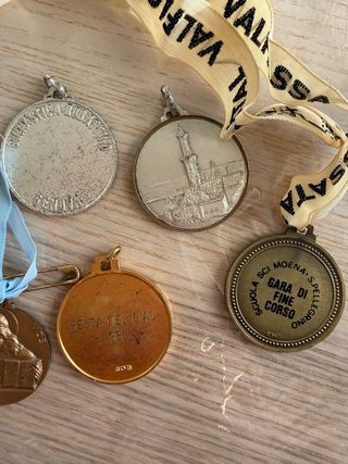 Medaglie sportive e religiose