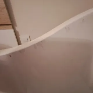 Cuna de madera blanca con osito