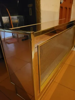 Cubre radiador dorado
