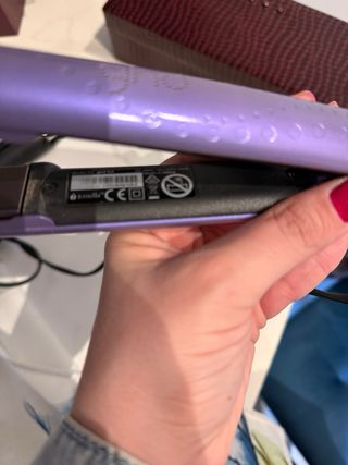 Piastra per capelli viola