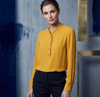 Blusa mostaza con volantes