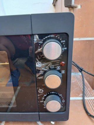 Horno SilverCrest con pollo asado
