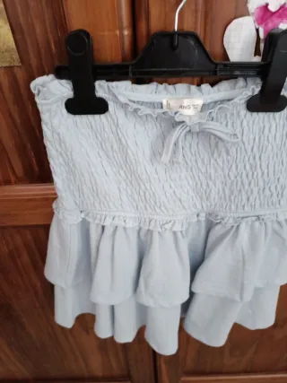 Falda corta Mango volantes T. XS  Color celeste