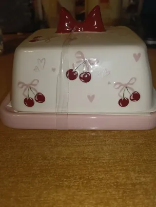 Porta burro Primark ciliegie e fiocco rosso