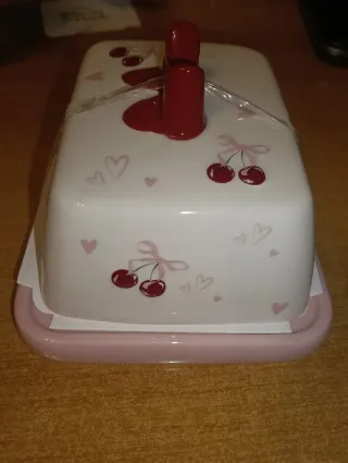 Porta burro Primark ciliegie e fiocco rosso