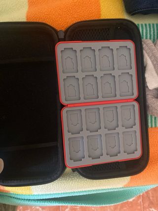 Nintendo Switch Lite + Porta Juego o se cambia