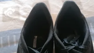 Zapatillas deportivas Puma negras y blancas