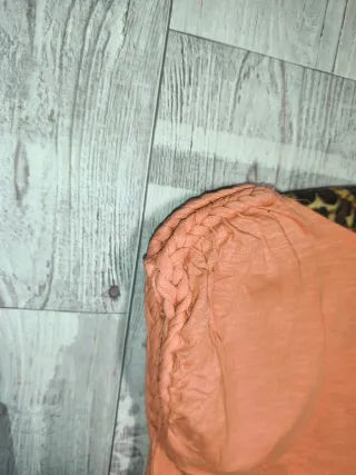 Camiseta naranja sin mangas