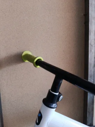 Bicicleta infantil Btwin blanca y amarilla