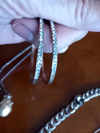 Lote de cadenas y pulseras plateadas