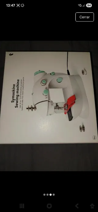 Máquina de coser blanca