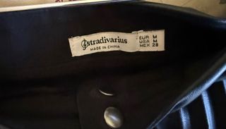 Falda larga negra cuero plisada