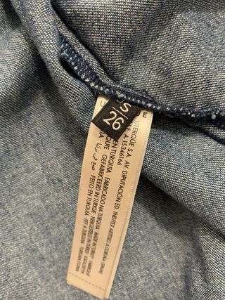 Abrigo Uterqüe tachuelas vaquero