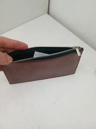 Cartera Zara brillos rosa dorado