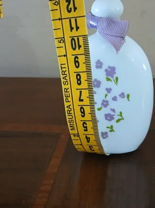 Bottiglietta Avon vuota decorata 1975