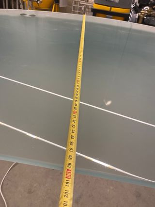 Mesa de cristal ovalada