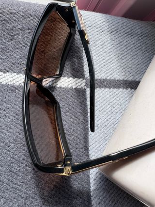 Gafas de sol Jimmy Choo negras y doradas