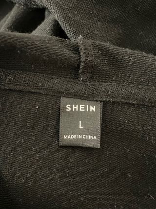 Sudadera sin mangas con capucha negra