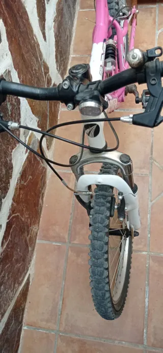 Bicicleta niña doble suspensión rosa
